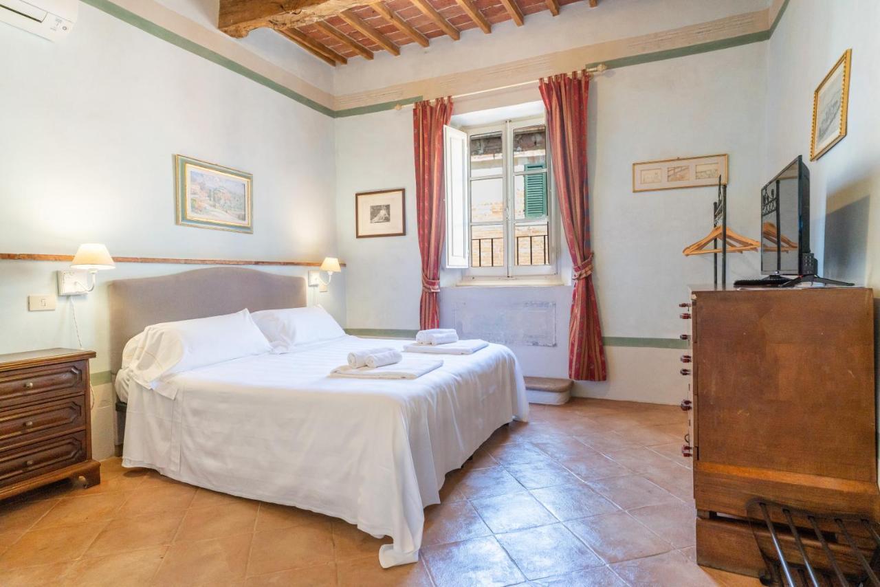 Palazzo Mosela Alla Porta Montepulciano Bagian luar foto